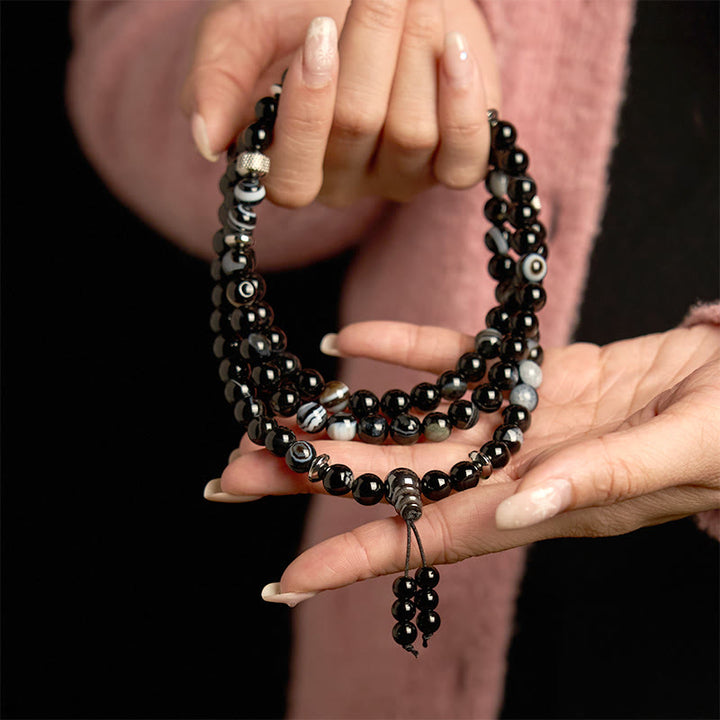 Pulsera de protección de ónix negro con 108 cuentas de piedra natural de Buddha Stones
