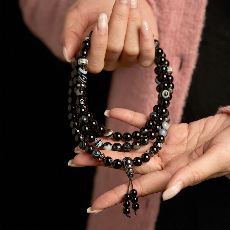 Pulsera de protección de ónix negro con 108 cuentas de piedra natural de Buddha Stones