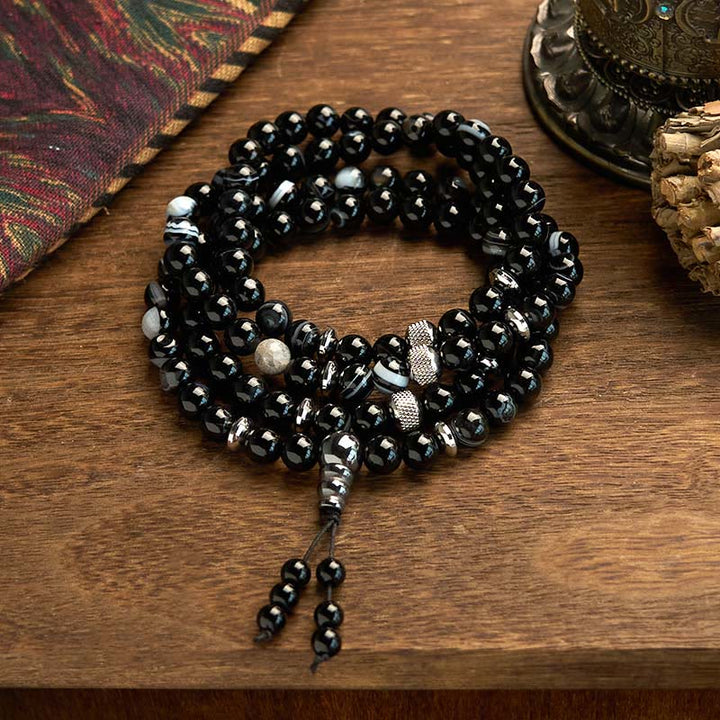 Pulsera de protección de ónix negro con 108 cuentas de piedra natural de Buddha Stones