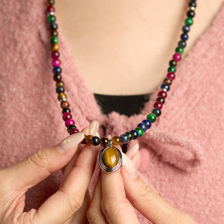 Pulsera de protección multivuelta con piedra de ojo de tigre de colores naturales y 108 cuentas de mala de Buddha Stones - image 5