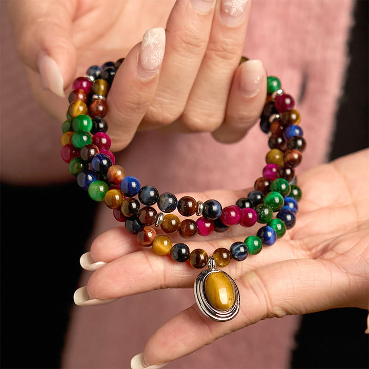Pulsera de protección multivuelta con piedra de ojo de tigre de colores naturales y 108 cuentas de mala de Buddha Stones - image 3