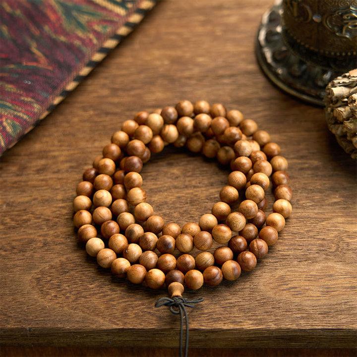 Pulsera de protección pulida a mano de madera de durazno con 108 cuentas de mala y Buddha Stones con efecto relámpago
