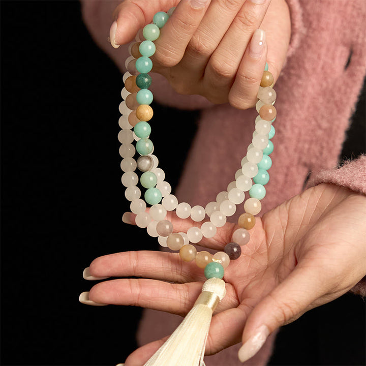 Pulsera de curación con borlas blancas y amazonita de jade blanco natural con 108 cuentas de mala de Buddha Stones