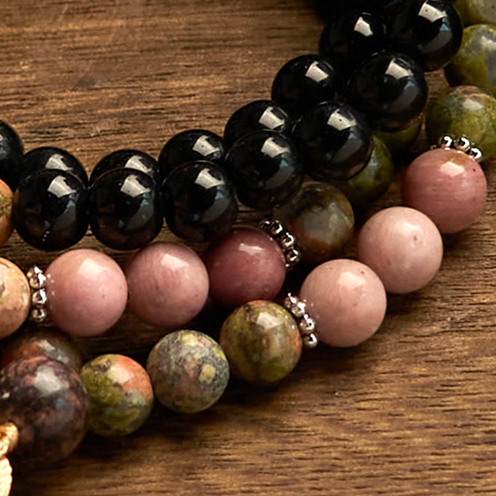 Pulsera curativa con borlas color caqui y rodonita de jaspe negro con 108 cuentas de mala de Buddha Stones