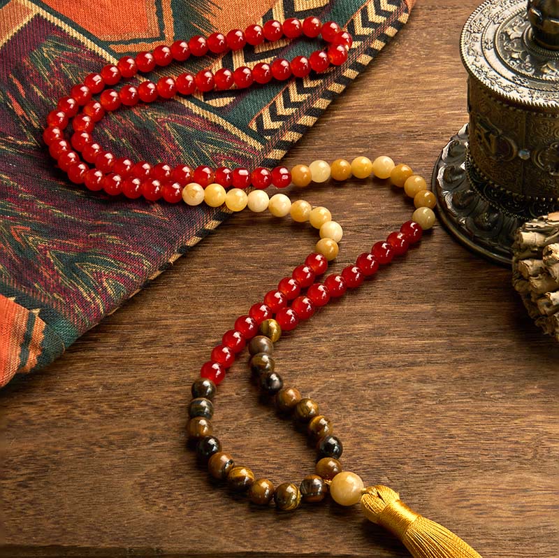 Buddha Stones con 108 cuentas de mala, ágata roja, ojo de tigre y borla amarilla