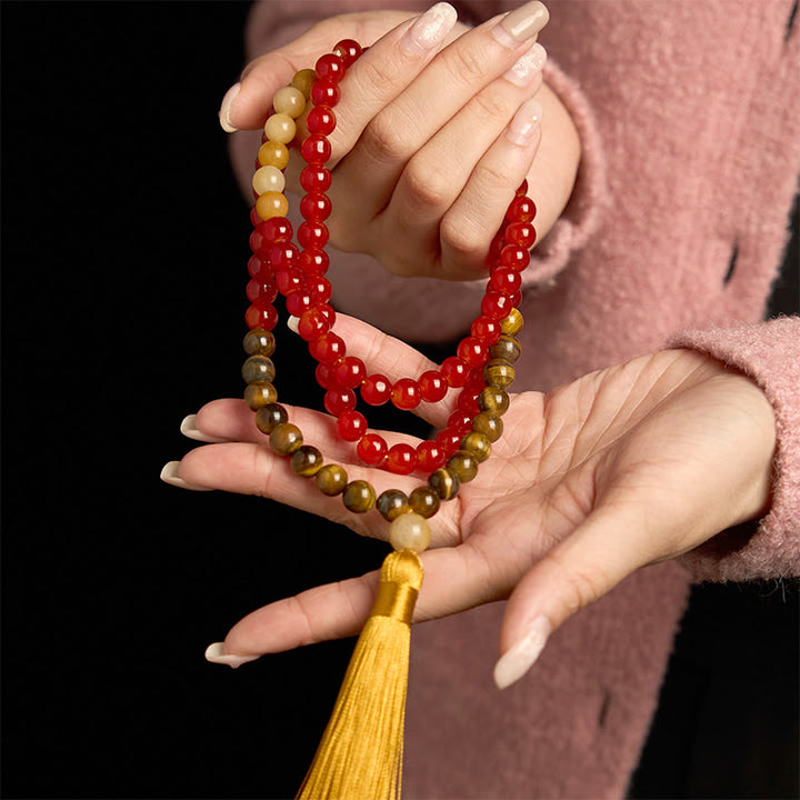 Buddha Stones con 108 cuentas de mala, ágata roja, ojo de tigre y borla amarilla
