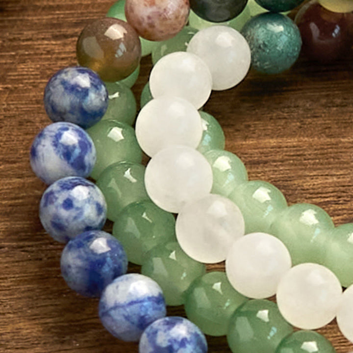 Pulsera de la Buddha Stones de mala, aventurina verde natural, jaspe de manchas azules, ágata india y borla verde