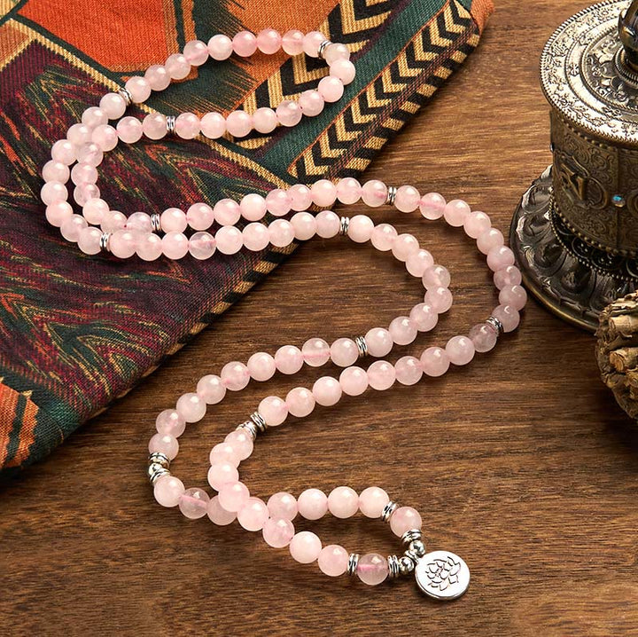 Pulsera de la paz con 108 cuentas de piedra natural de Buddha Stones , cuarzo rosa y loto