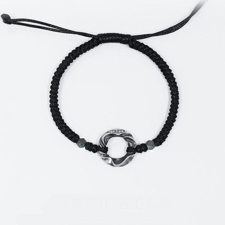 Pulsera de protección con cuerda de cera negra y hebilla de paz de plata de ley 999 con Buddha Stones