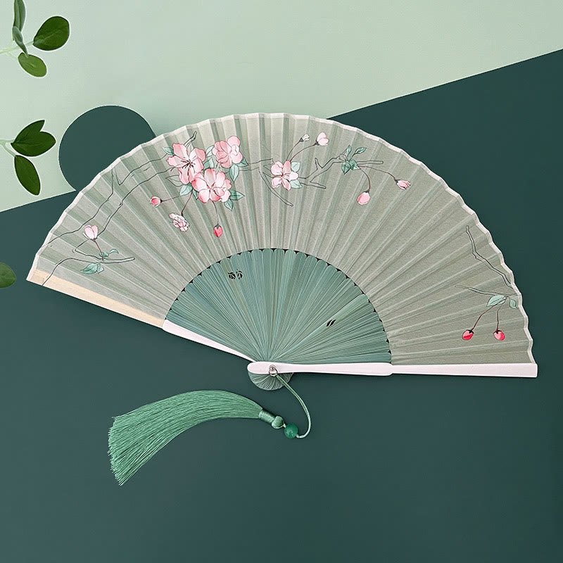 Abanico plegable de bambú con flores de begonia, orquídea y Buddha Stones