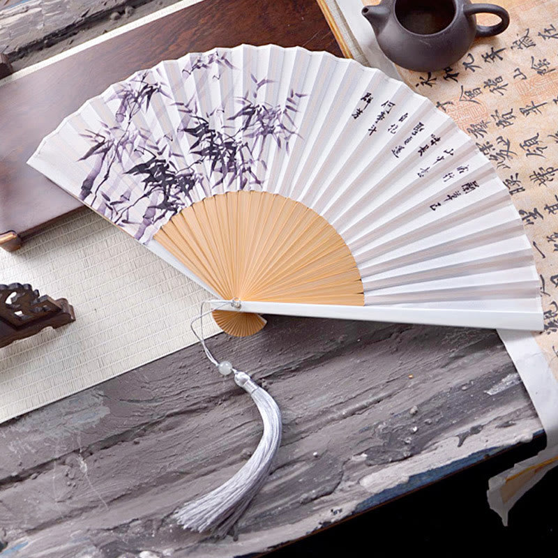 Abanico plegable de bambú y crepé de poliéster de 23,3 cm con pintura en tinta de caracteres chinos, diseño de flores de Buddha Stones y hojas