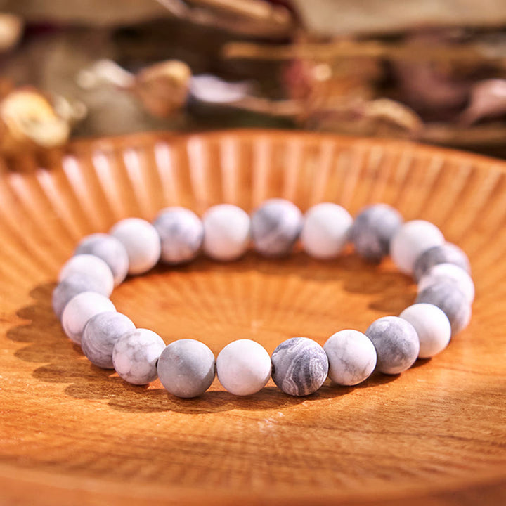 Pulsera de equilibrio de conexión a tierra de la serie de colores neutros con Buddha Stones que conducen de regreso a la Tierra
