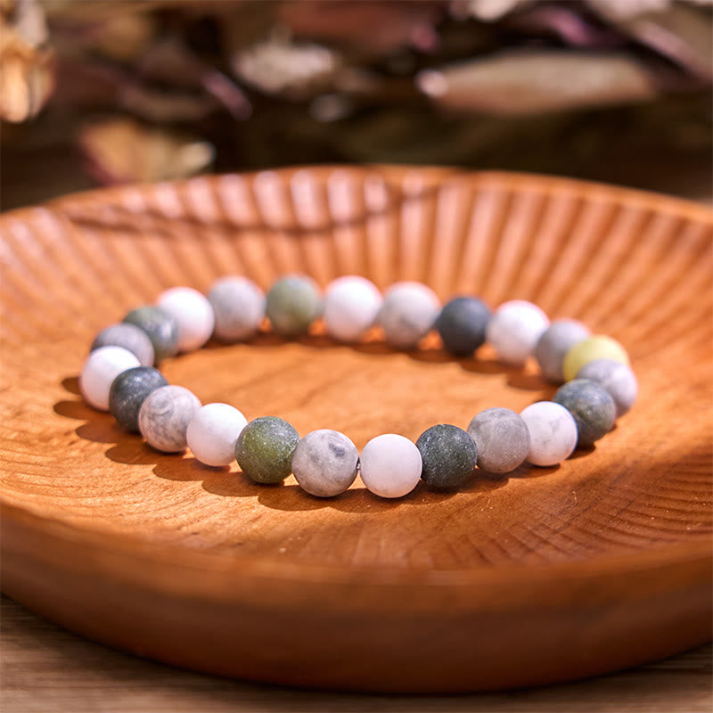 Pulsera de equilibrio de conexión a tierra de la serie de colores neutros con Buddha Stones que conducen de regreso a la Tierra