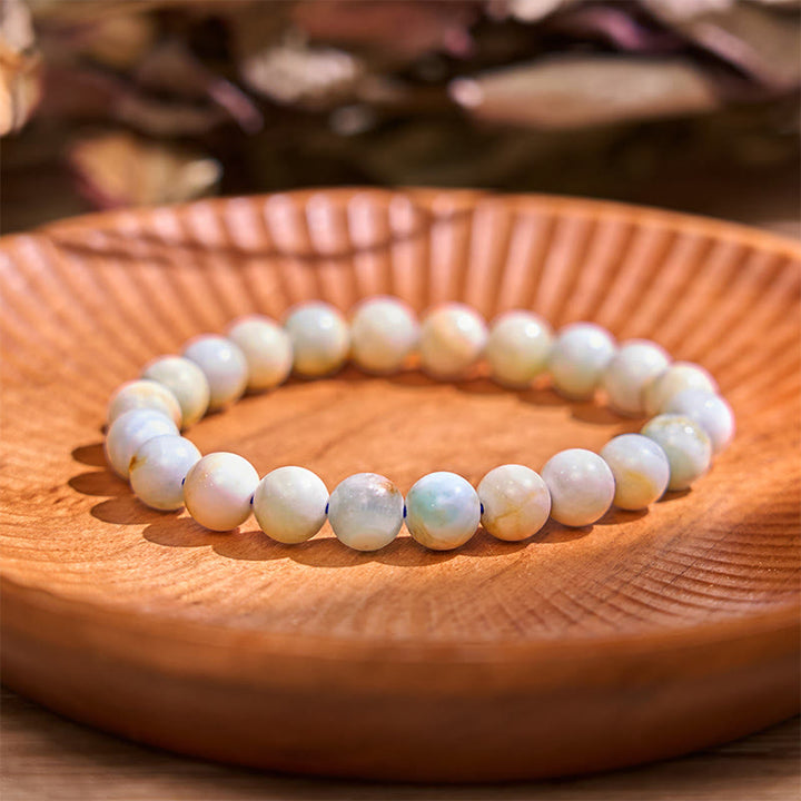 Pulsera de equilibrio de conexión a tierra de la serie de colores neutros con Buddha Stones que conducen de regreso a la Tierra