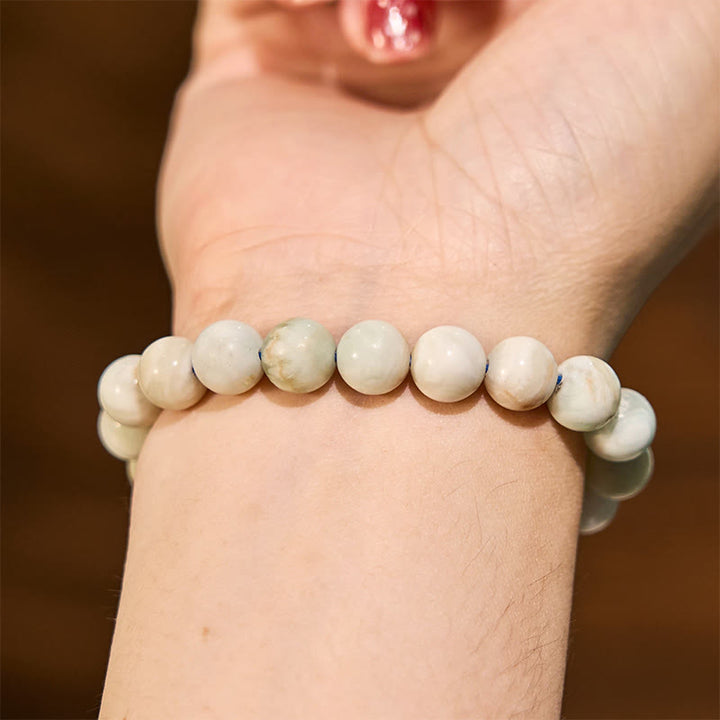 Pulsera de equilibrio de conexión a tierra de la serie de colores neutros con Buddha Stones que conducen de regreso a la Tierra