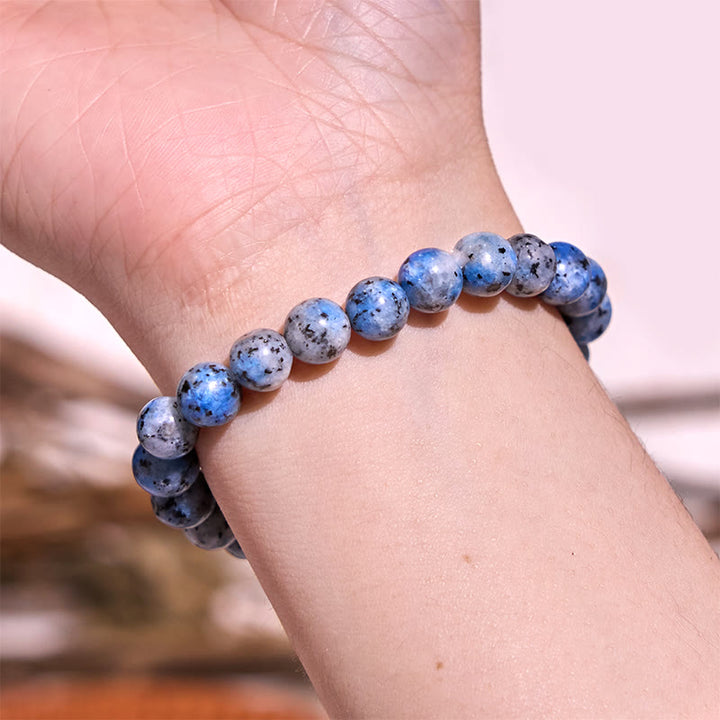 Pulsera de tranquilidad y amor con Buddha Stones que restauran la calma en colores fríos