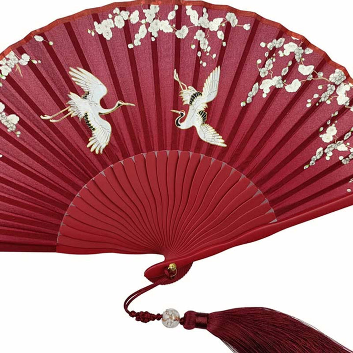 Abanico plegable de bambú y seda con diseño de grulla y ciruelo en flor y Buddha Stones