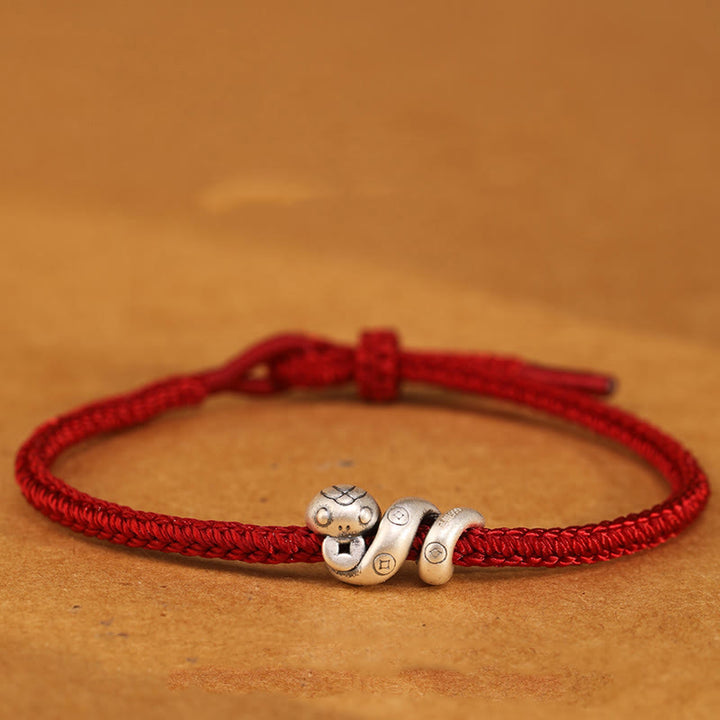 Pulsera trenzada de protección con monedas de cobre del año de la serpiente en plata de ley 999 con Buddha Stones