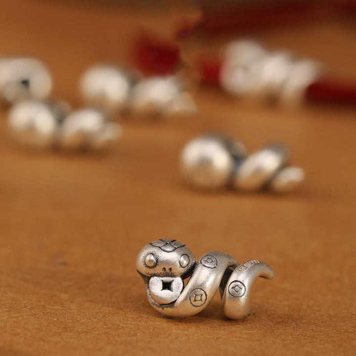 Pulsera trenzada de protección con monedas de cobre del año de la serpiente en plata de ley 999 con Buddha Stones