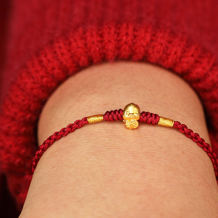 Pulsera de la suerte hecha a mano con monedas de cobre y el símbolo Fu del año de la serpiente en oro 999 de Buddha Stones