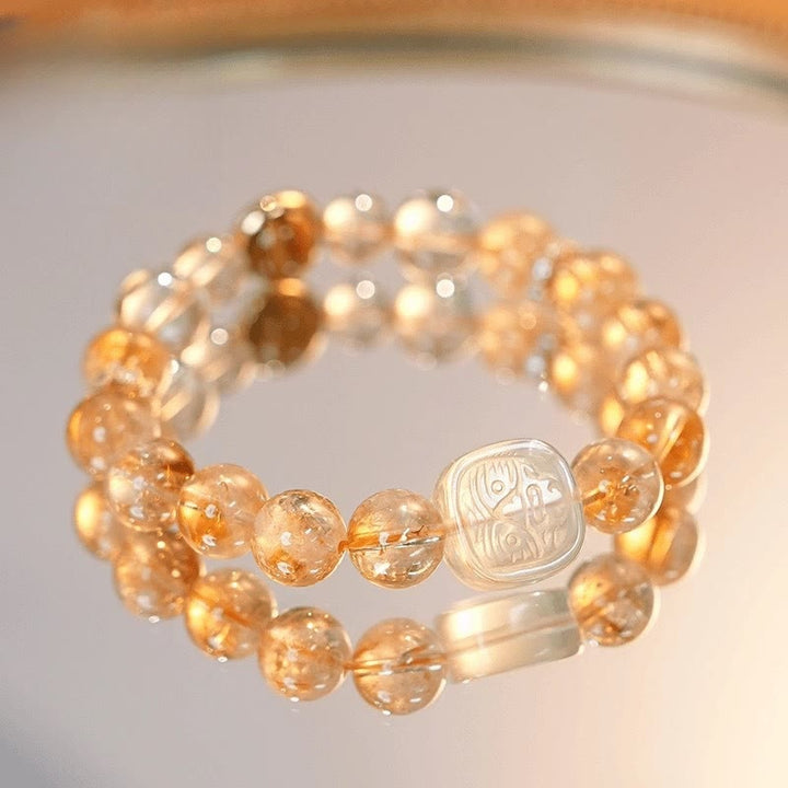 Pulsera de la diosa de la riqueza con zakiram, ojo de tigre, topacio y citrino de Buddha Stones