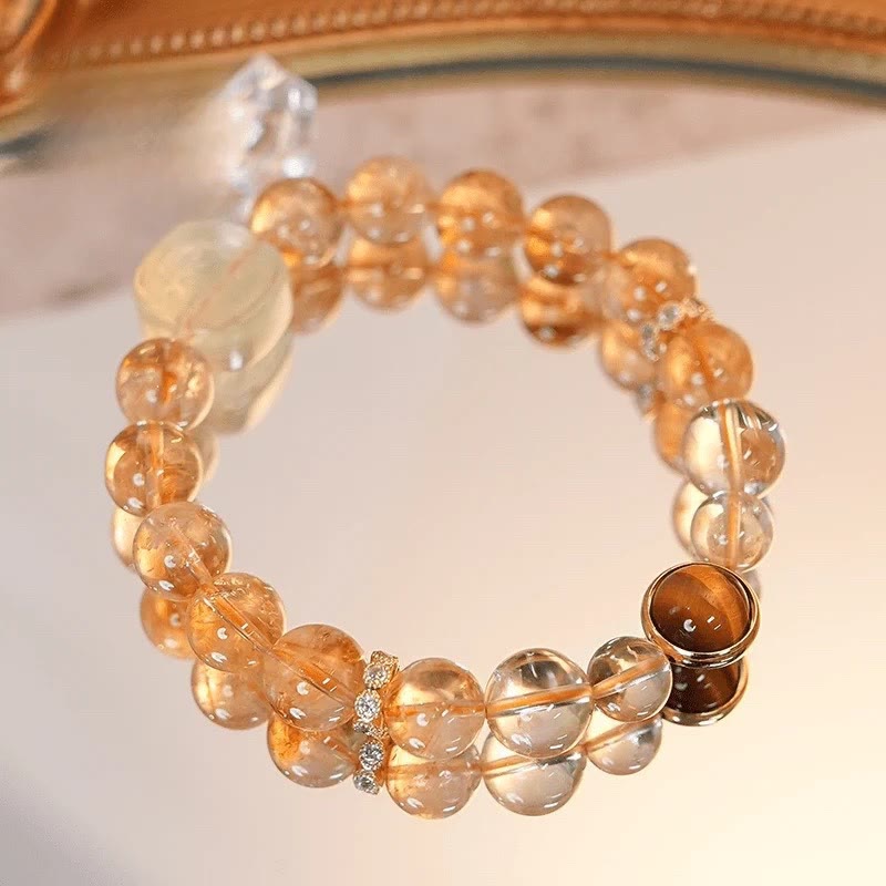 Pulsera de la diosa de la riqueza con zakiram, ojo de tigre, topacio y citrino de Buddha Stones