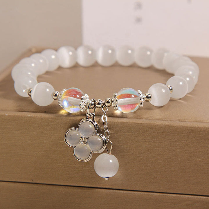 Pulsera con dije de trébol de cuatro hojas de la suerte y cristal de ojo de gato con Buddha Stones