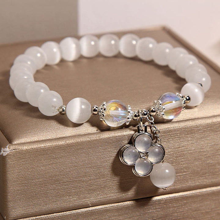 Pulsera con dije de trébol de cuatro hojas de la suerte y cristal de ojo de gato con Buddha Stones