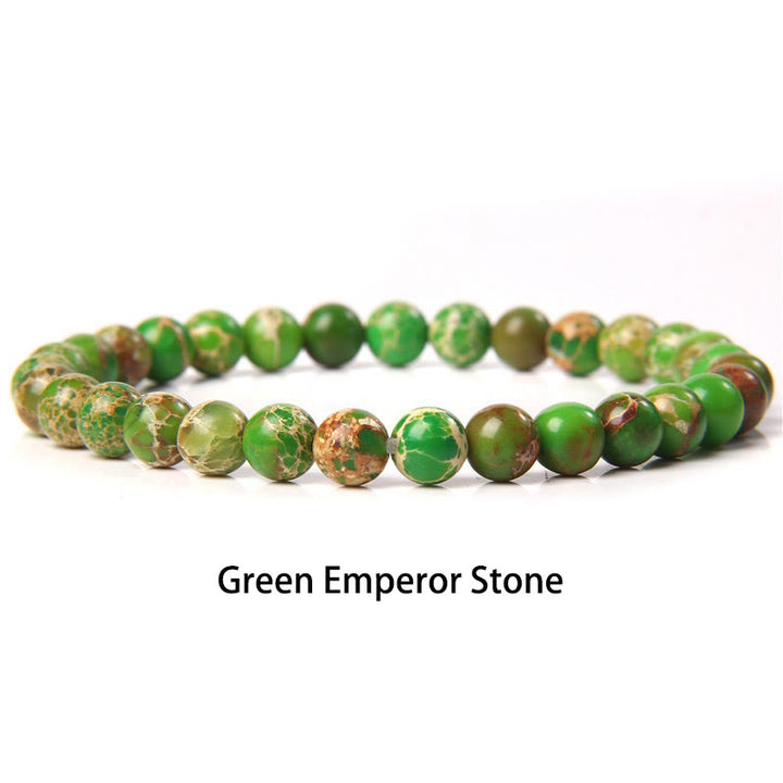 Pulsera protectora con cuentas de ojo de tigre rojo y Buddha Stones de 6 mm y cristales de varias piedras con purpurina negra