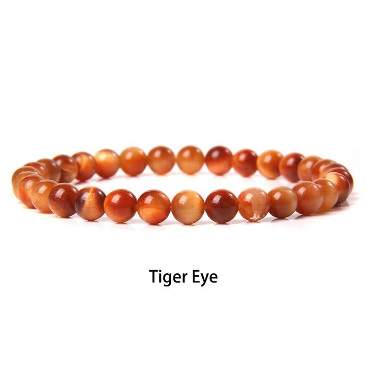 Pulsera protectora con cuentas de ojo de tigre rojo y Buddha Stones de 6 mm y cristales de varias piedras con purpurina negra