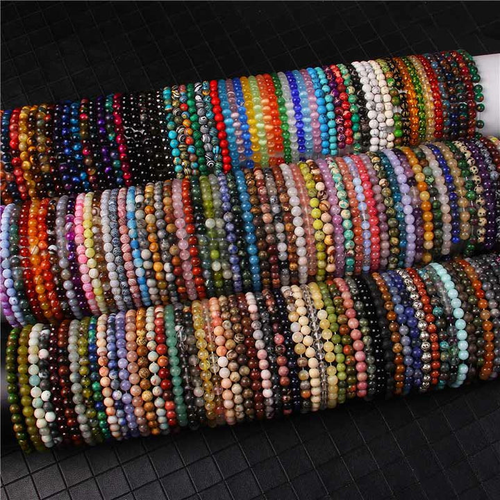 Pulsera protectora con cuentas de ojo de tigre rojo y Buddha Stones de 6 mm y cristales de varias piedras con purpurina negra