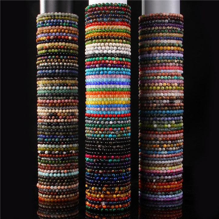 Pulsera protectora con cuentas de ojo de tigre rojo y Buddha Stones de 6 mm y cristales de varias piedras con purpurina negra