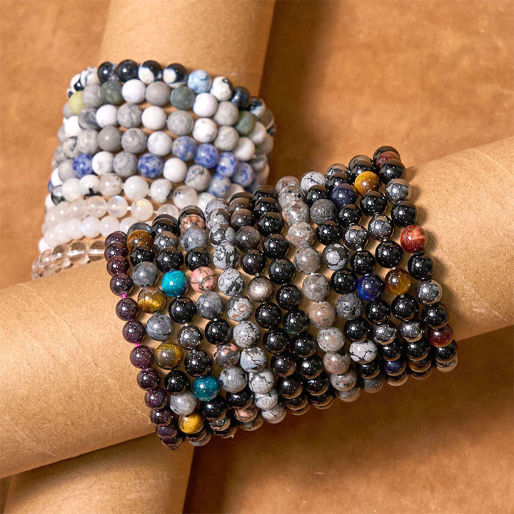 Pulsera de equilibrio de conexión a tierra de la serie de colores neutros con Buddha Stones que conducen de regreso a la Tierra
