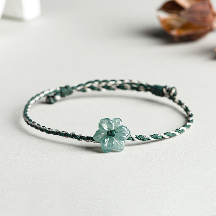 Pulsera de prosperidad trenzada con orquídea de jade y hilo verde hecha a mano con Buddha Stones