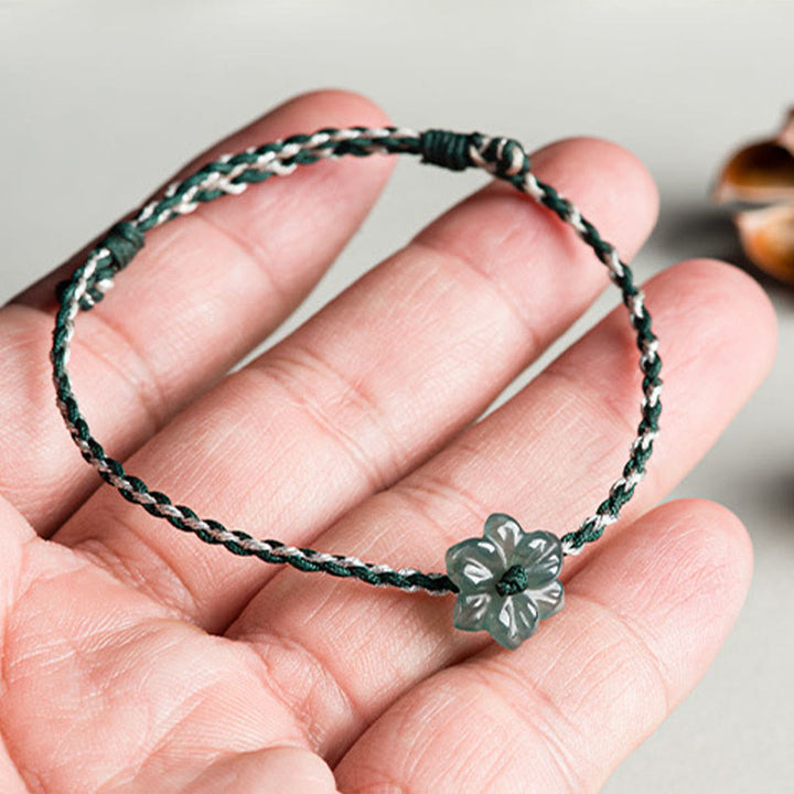 Pulsera de prosperidad trenzada con orquídea de jade y hilo verde hecha a mano con Buddha Stones