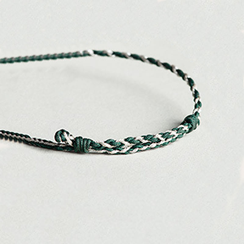 Pulsera de prosperidad trenzada con orquídea de jade y hilo verde hecha a mano con Buddha Stones