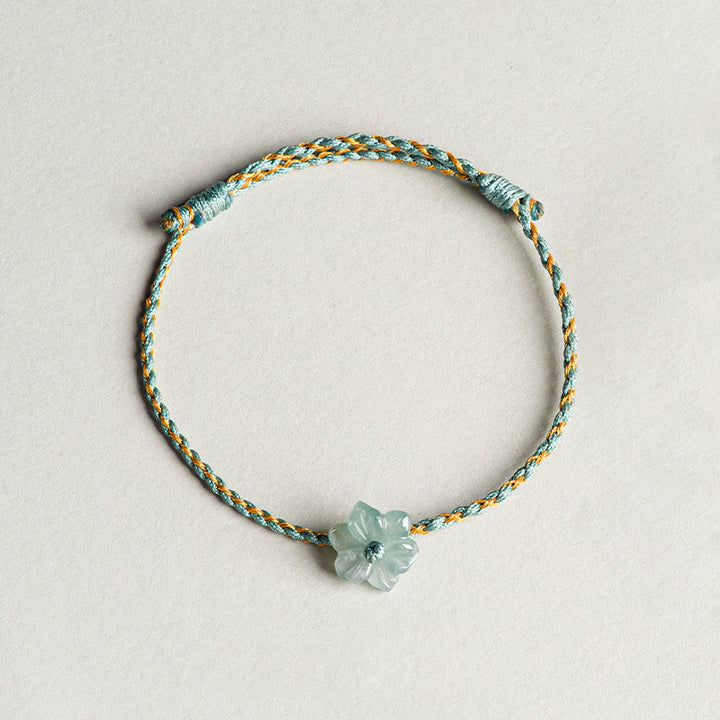 Pulsera de prosperidad trenzada con orquídea de jade y hilo verde hecha a mano con Buddha Stones