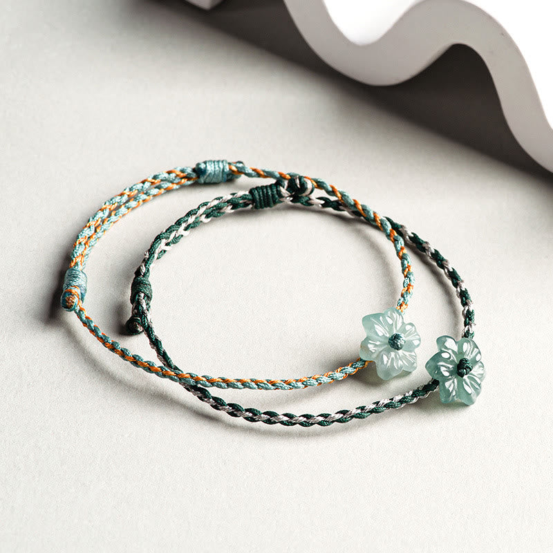 Pulsera de prosperidad trenzada con orquídea de jade y hilo verde hecha a mano con Buddha Stones