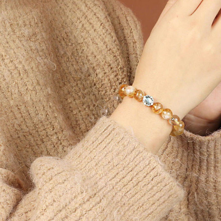 Pulsera de prosperidad con cuarzo rutilado y citrino natural de Buddha Stones