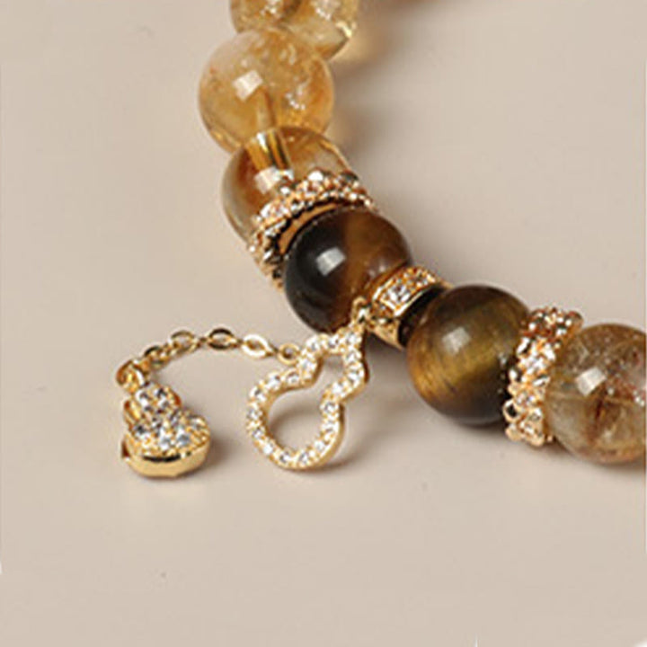 Pulsera de fuerza con calabaza de la suerte y cuentas de citrino y ojo de tigre natural de Buddha Stones