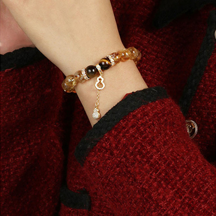 Pulsera de fuerza con calabaza de la suerte y cuentas de citrino y ojo de tigre natural de Buddha Stones