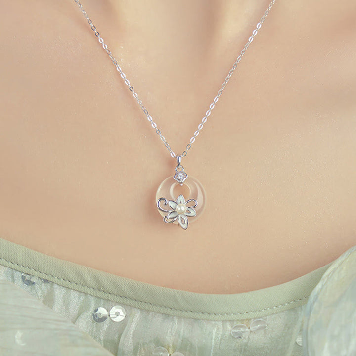 Colgante de plata de ley 999 con forma de loto y hebilla de paz con Buddha Stones y calcedonia