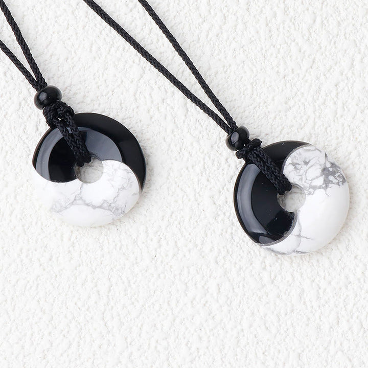 Collar con colgante de fuerza con cuerda trenzada y diseño de hebilla de paz Yin Yang con obsidiana negra natural y turquesa blanca y Buddha Stones