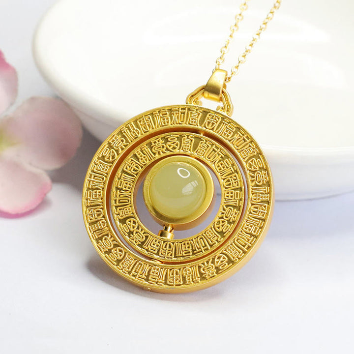 Colgante de collar giratorio con símbolo de suerte Fu de las cien bendiciones de jade hetiano de Buddha Stones