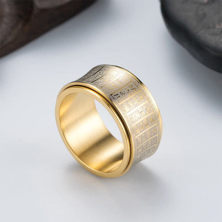 Anillo de equilibrio giratorio de acero y titanio con escritura de sello tibetano y mantra de luz dorada con Buddha Stones