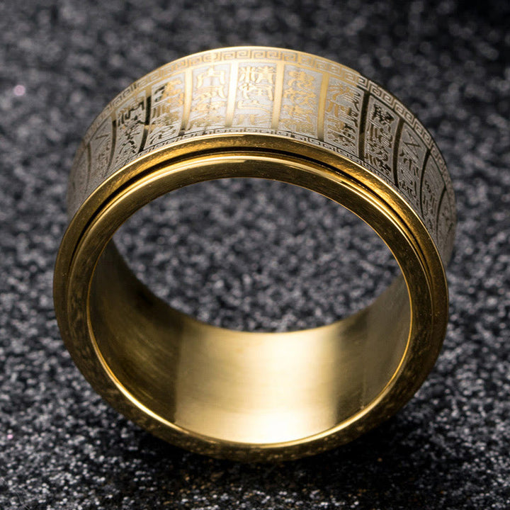 Anillo de equilibrio giratorio de acero y titanio con escritura de sello tibetano y mantra de luz dorada con Buddha Stones