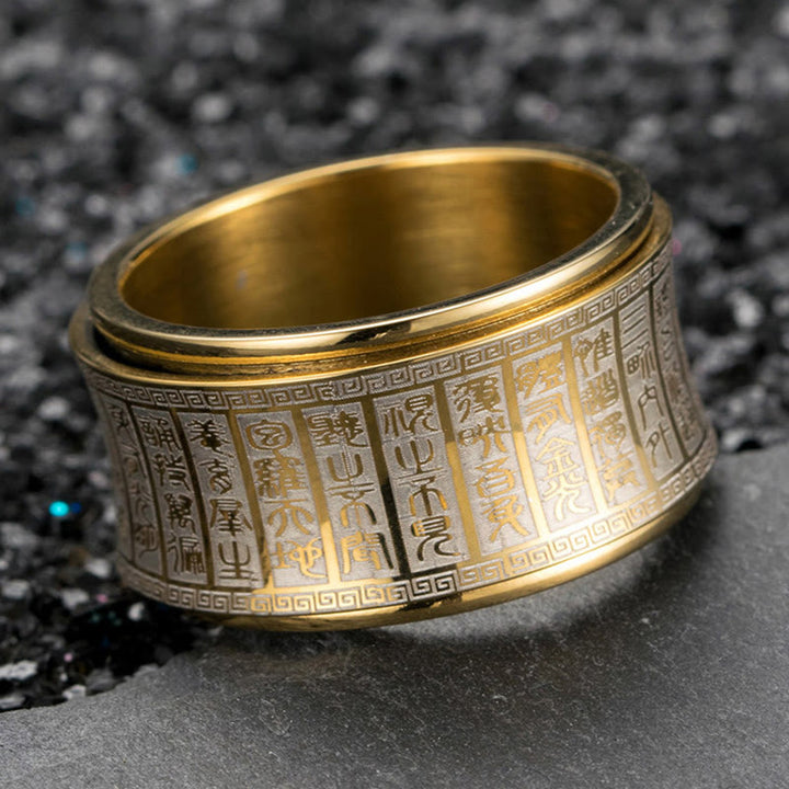 Anillo de equilibrio giratorio de acero y titanio con escritura de sello tibetano y mantra de luz dorada con Buddha Stones