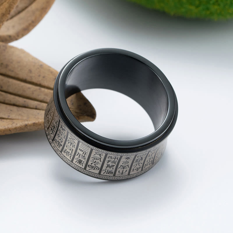 Anillo de equilibrio giratorio de acero y titanio con escritura de sello tibetano y mantra de luz dorada con Buddha Stones