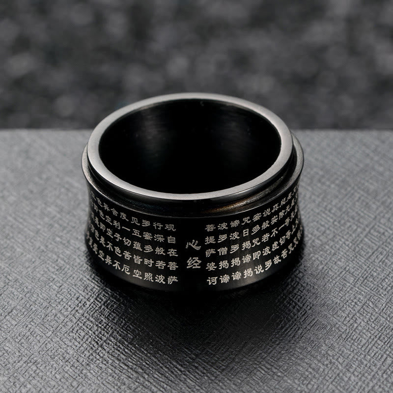 Anillo de equilibrio giratorio de acero y titanio con escrituras tibetanas en miniatura y Buddha Stones
