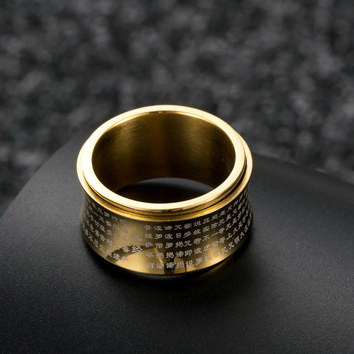 Anillo de equilibrio giratorio de acero y titanio con escrituras tibetanas en miniatura y Buddha Stones